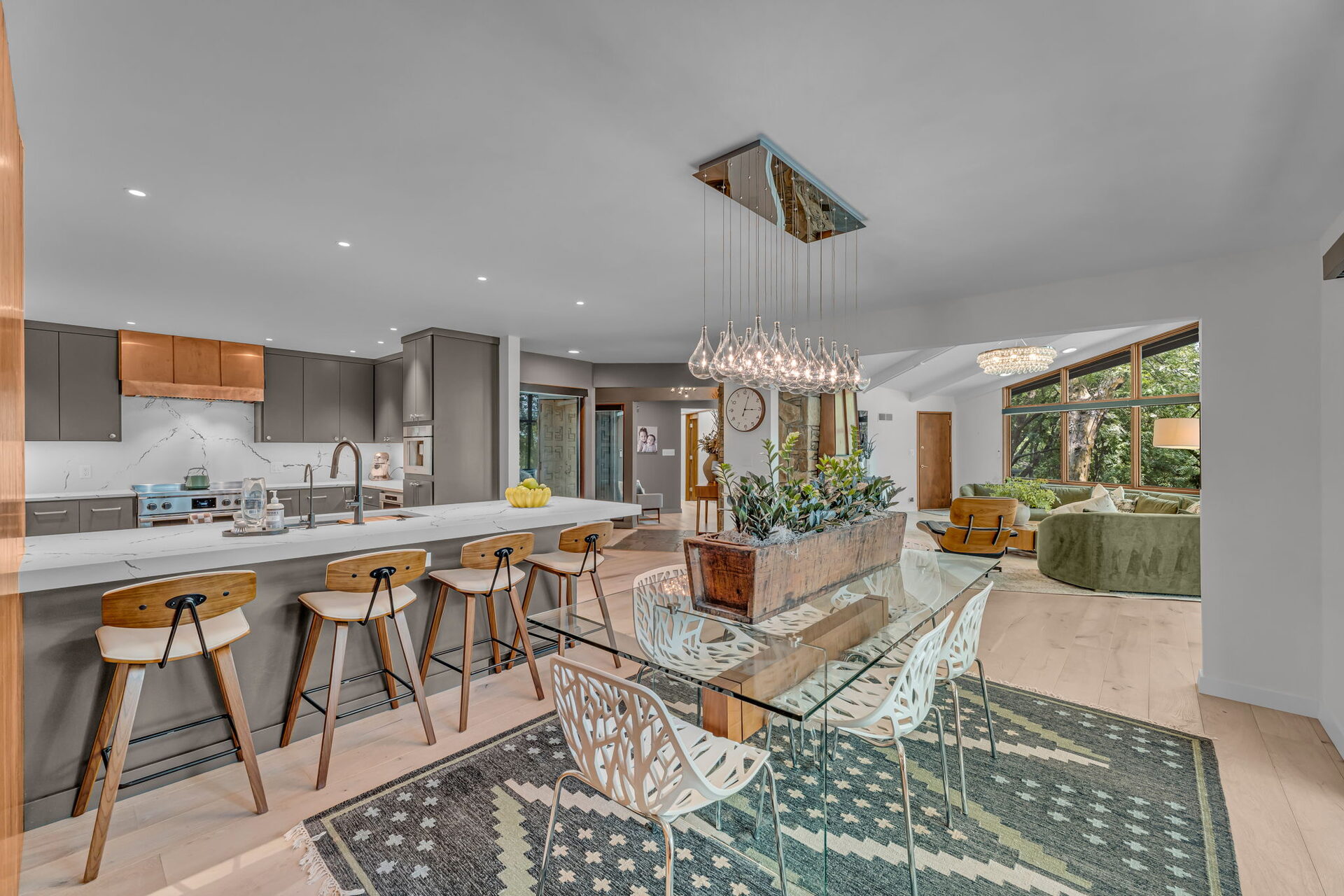 Open concept kitchen, dining, and living view