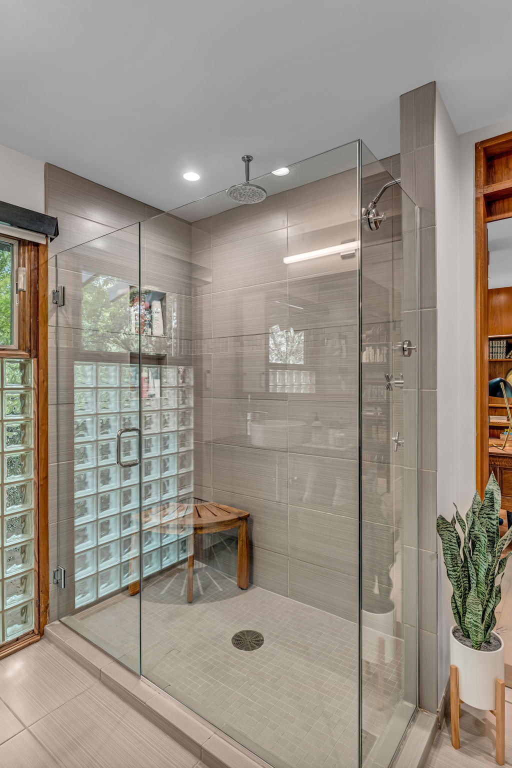 Primary bath curbless glass shower