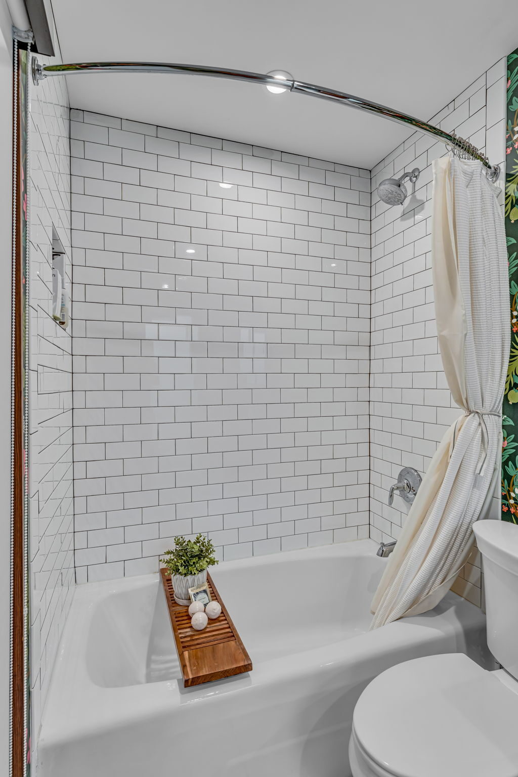Subway tile tub and shower bathroom